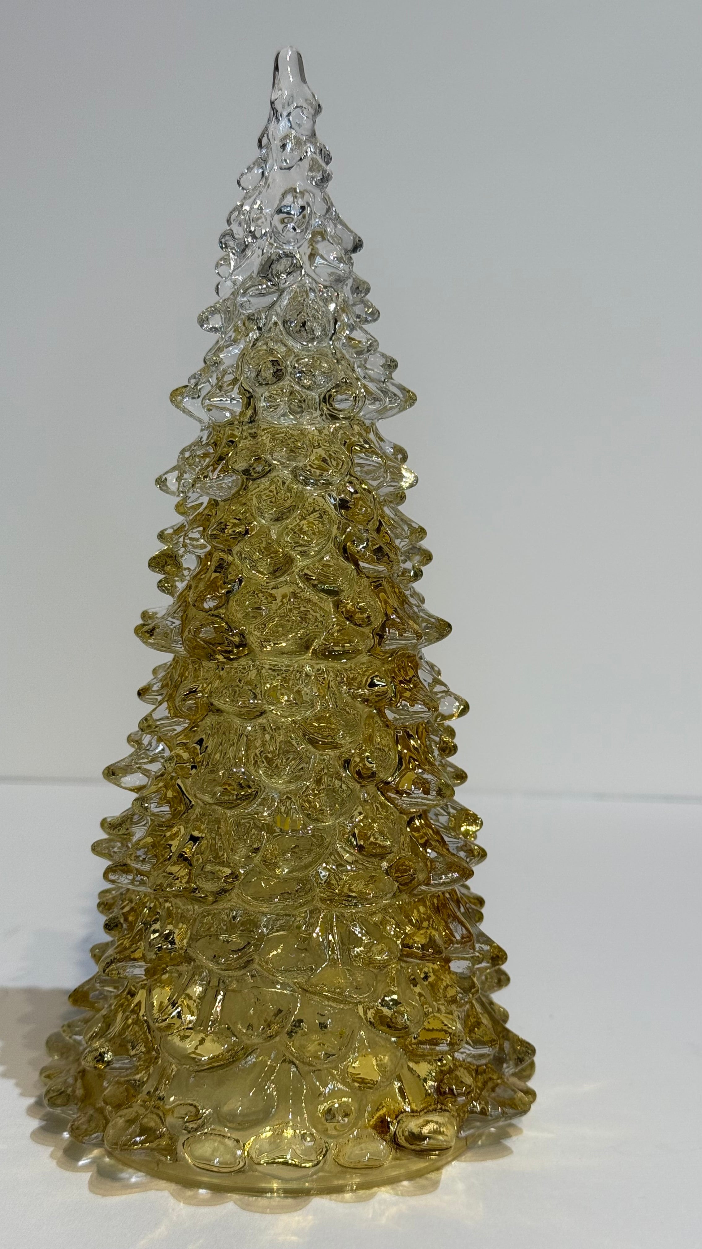 Pino de vidrio dorado