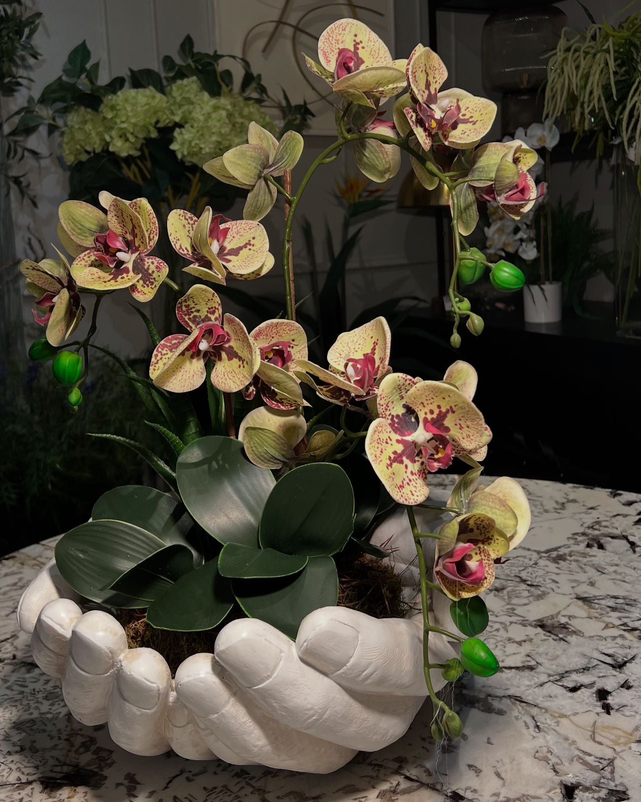 arreglo de orquídea mano