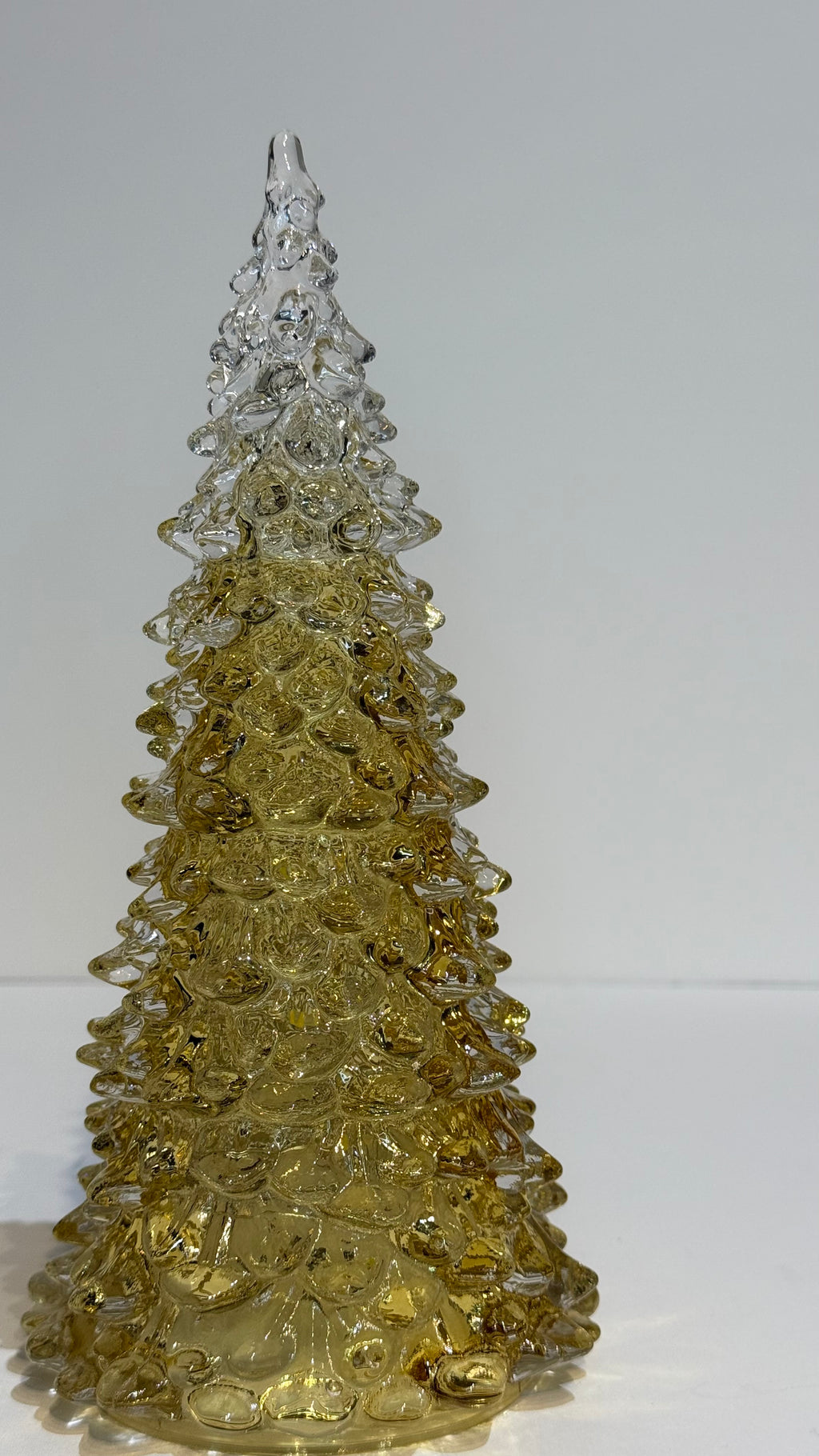 Pino de vidrio dorado